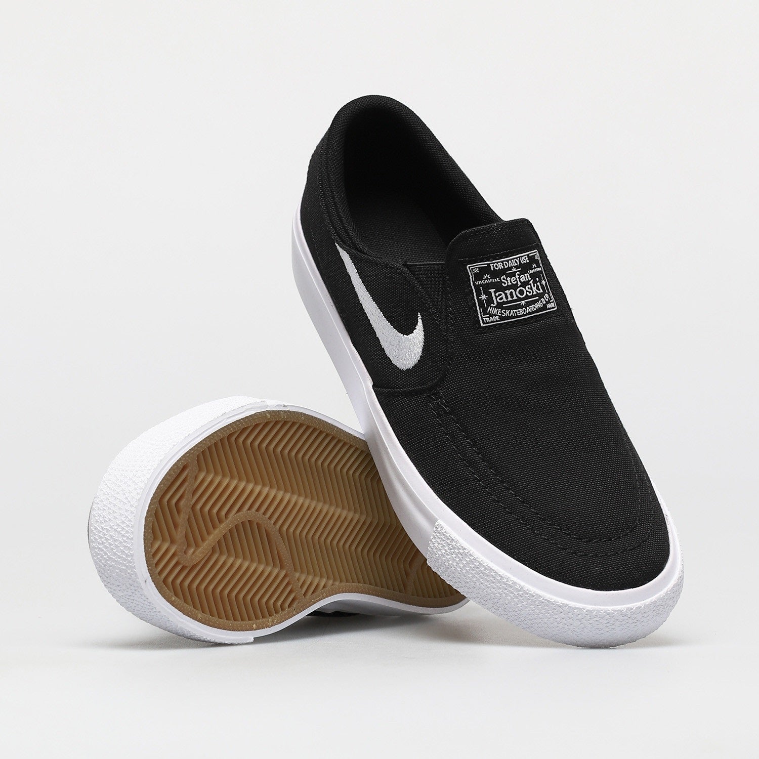 Sb janoski black and white canvas slip-on skate shoes Clearance